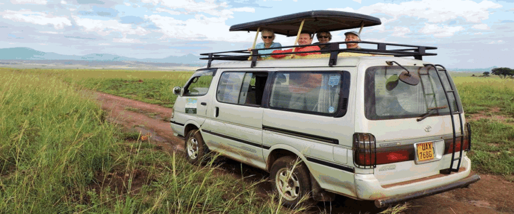 Uganda Tours - tourists in safari van