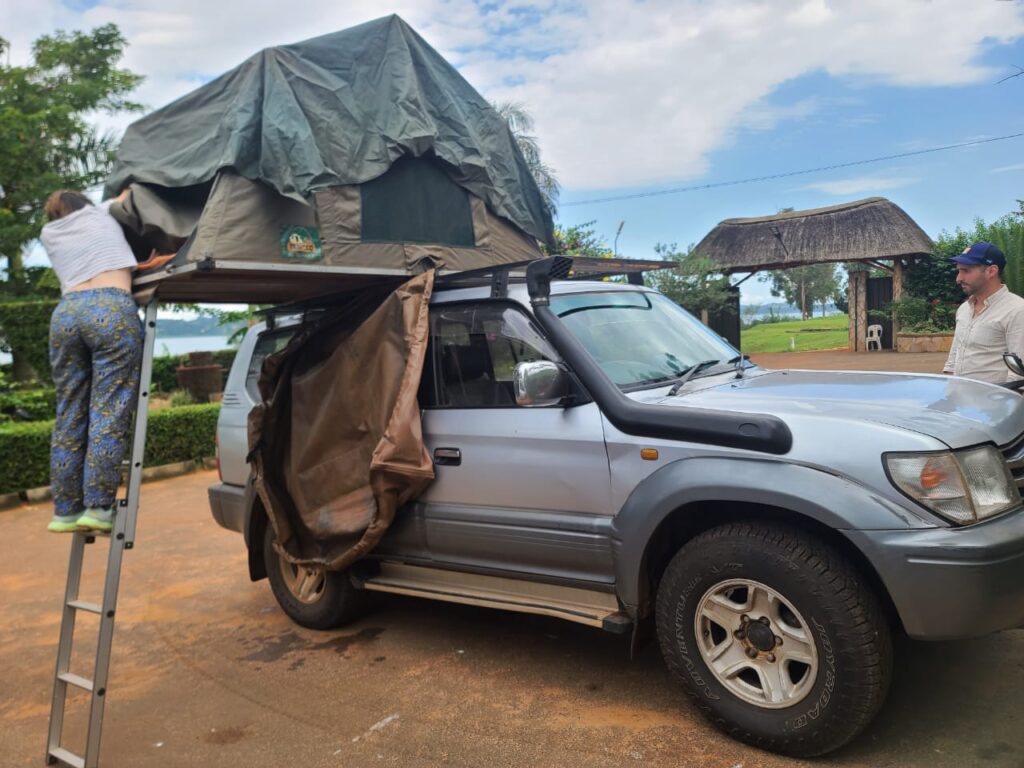 rooftop-tent-safari-land-cruiser | Uganda Car Rental Services Set up a rooftop tent land cruiser in Uganda
